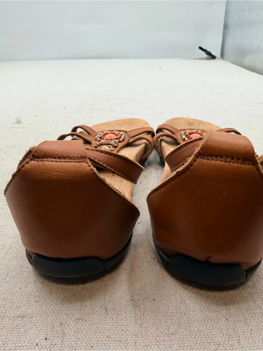 Minnetonka Women's Tan Beaded T-Strap Sandals